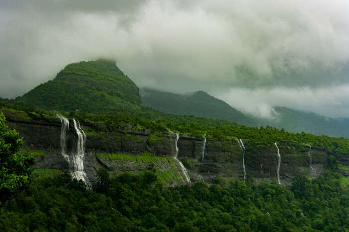 Strams of waterfall gushing down the mountains in Bhimashankar