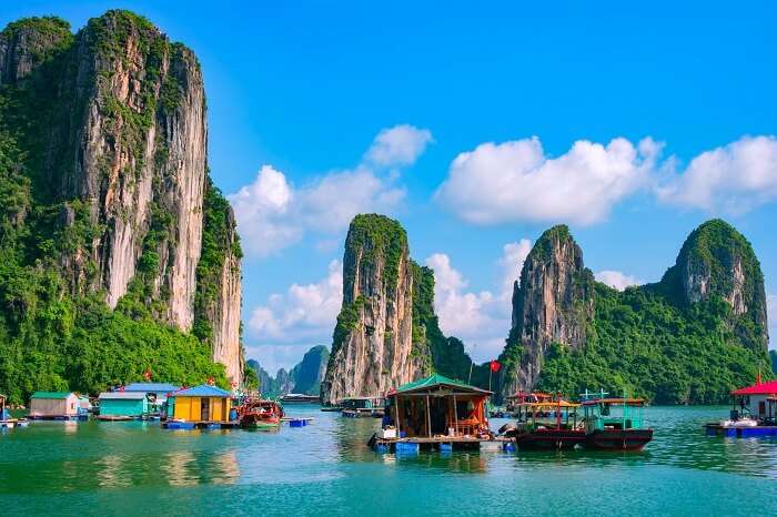 A beautiful snap of the floating fishing village and the rock island in Halong Bay