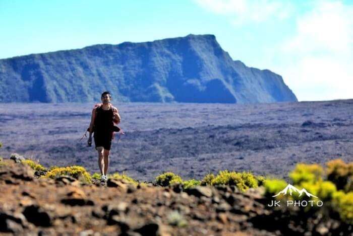 man hiking in Reunion Island, France