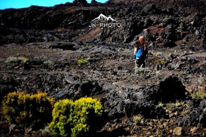 female traveler hikes in Reunion Island, France