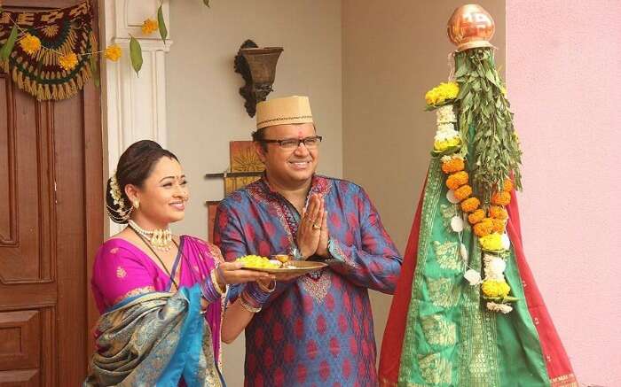 a couple worshipping during Gudi Padwa