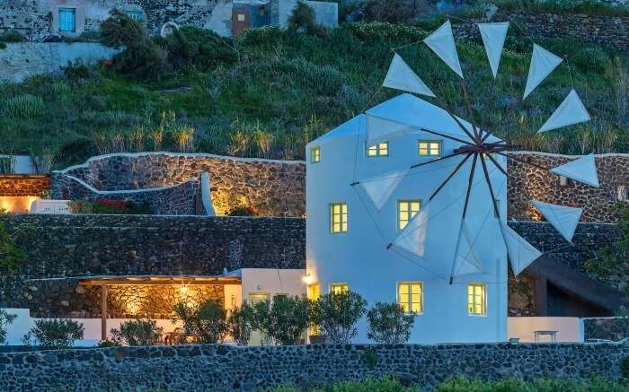 a windmill style villa in Santorini
