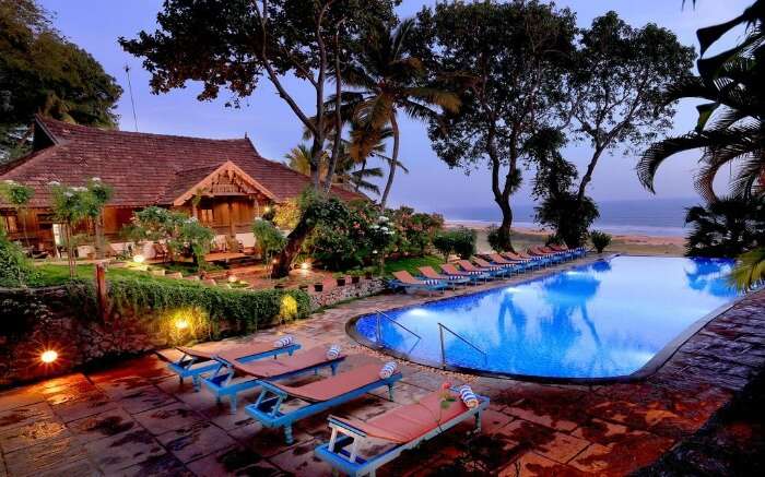 an outdoor pool with sea view in Somatheeram Ayurvedic Health Resortv 