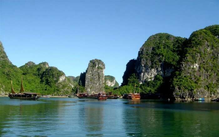 boats sailing on the waters of Halong Bay 