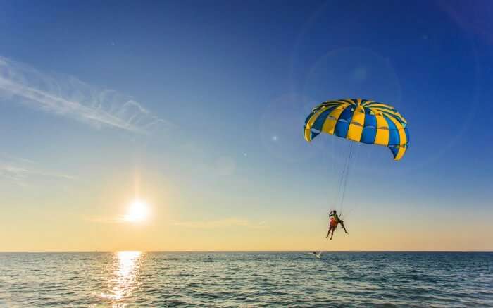 parasailing over an ocean