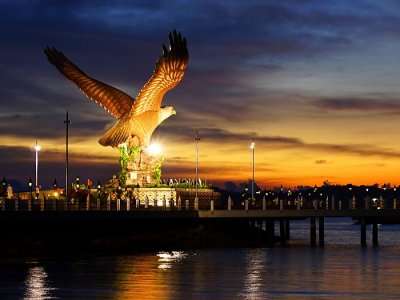 A late evening shot of the iconic Eagle statue by the sea in Langkawi