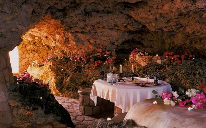 A romantic dining setting in a cave resort 