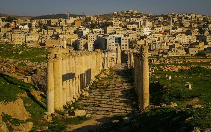 Ancient Jerash and modern Jerash in one picture