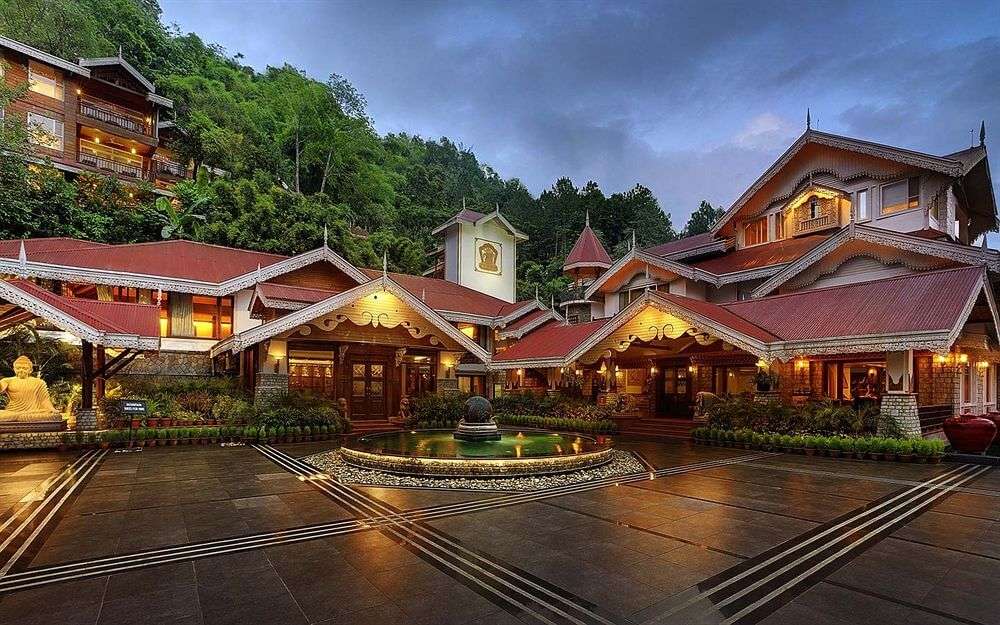 a beautifully lit resort amid jungle