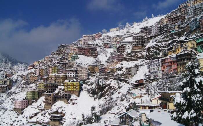 A splendid view of Shimla during snowfall which is one of famous destinations to visit in winter in India