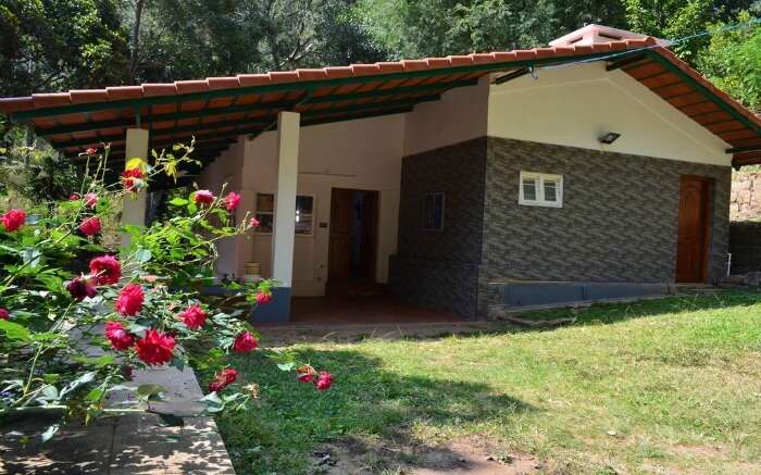 Side view and from the gardens of Water Rock Bungalow in Yercaud 