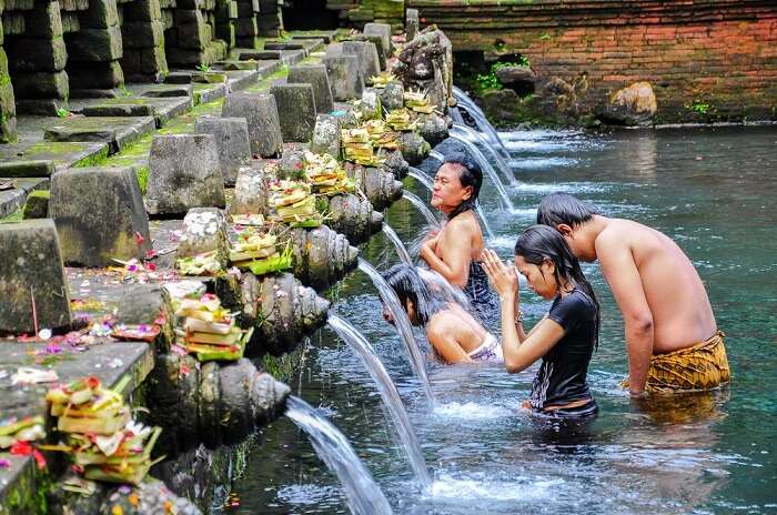 holy water ritual bath in bali temple