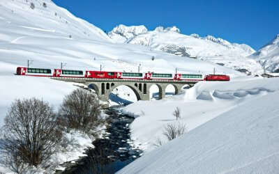 The Glacier Express crossing a bridge in the Swiss Alps