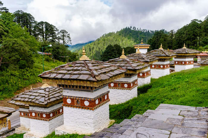 beautiful chortens on green hillside