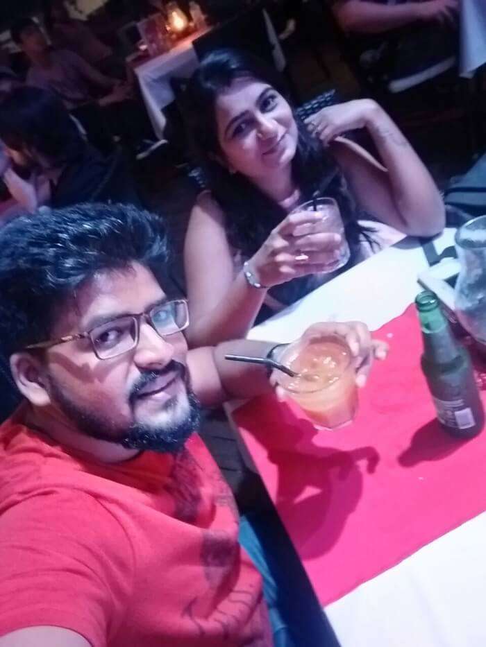 nirav & wife enjoying drinks at rock bar in bali