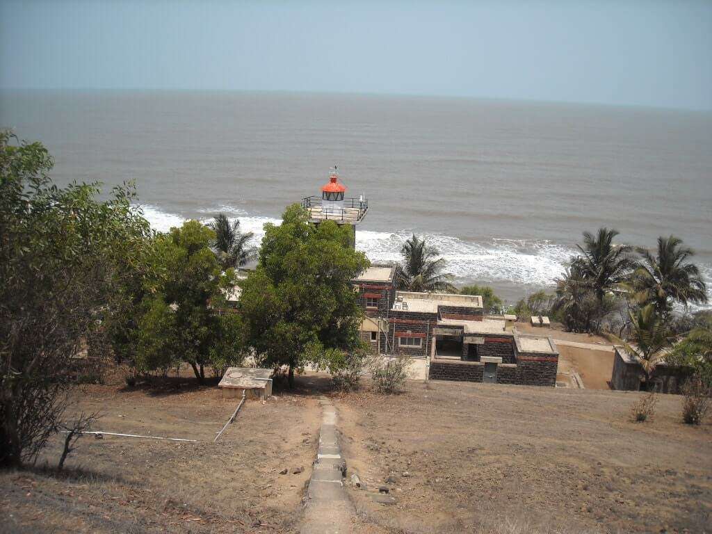view of a beach from a cliff