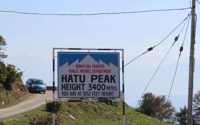 The signboard displaying the altitude of Hatu Peak