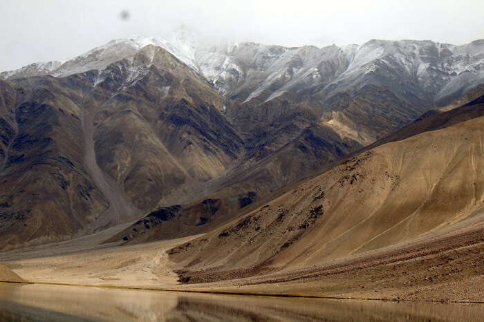 barren mountains at chandra taal lake