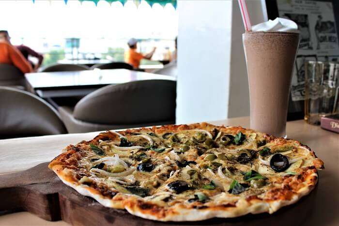 dine at Jheel’s Rooftop Restaurant in udaipur