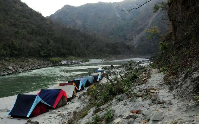 Beautiful tents aligned by the riverside in Rishikesh