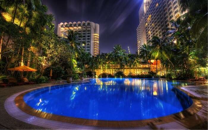 A gorgeous blue pool in a hotel 