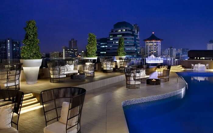 A terrace restaurant in a hotel with swimming pool 