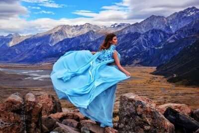 Solo female traveler in a flowy dress