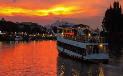 One of the Mandovi River Cruises in Goa sailing into the sunset 