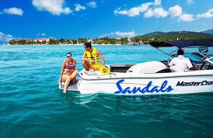 Couple enjoying watersports at Sandals Resort Jamaica
