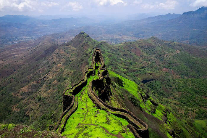 A fort with lush green meadows