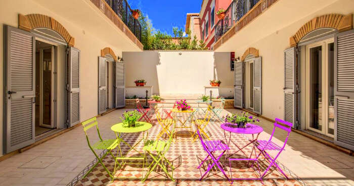 colourful chairs in the lobby of a hostel