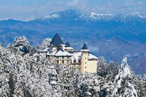 An amazing view of cecil hotel with snowfall in Shimla