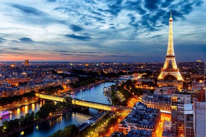 All about the Eiffel Tower by night in Paris