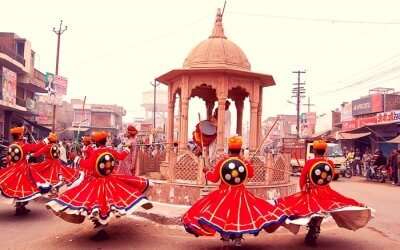Rajasthani men dancing on the eve of Holi