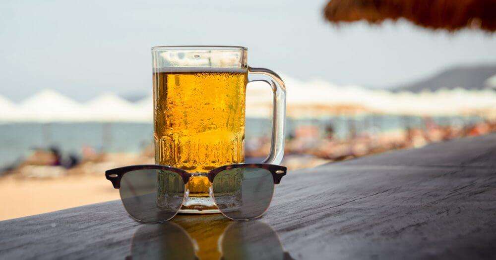 having beer at the beach