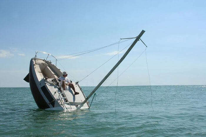 Boat sinking in the ocean