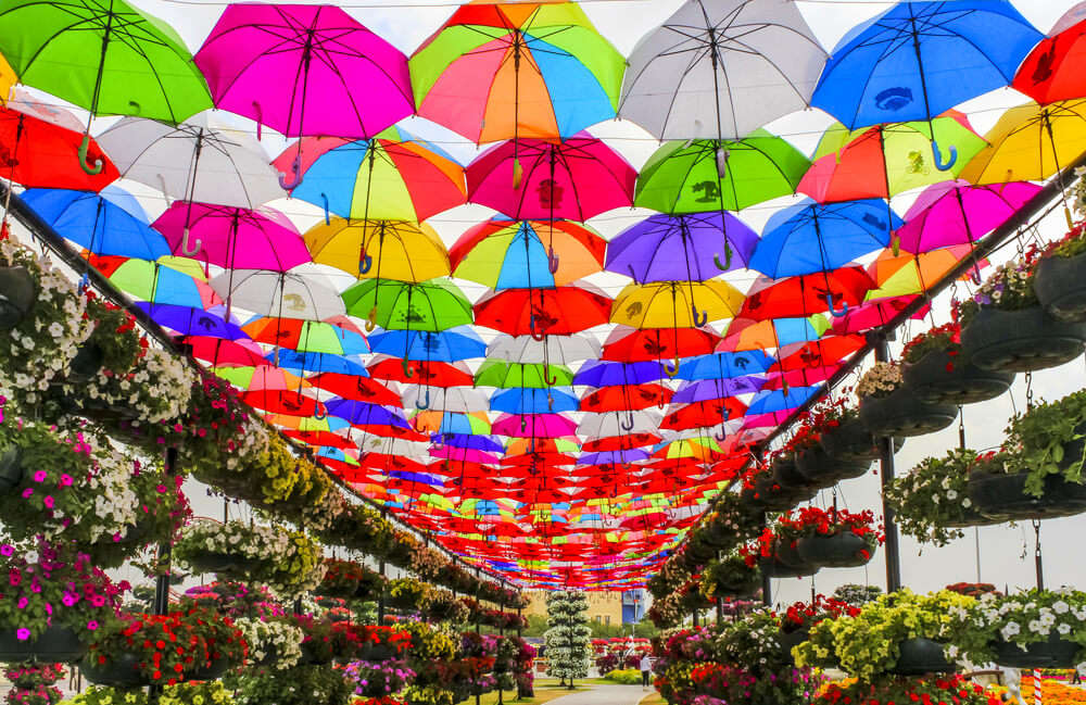 colorful umbrellas hung over street