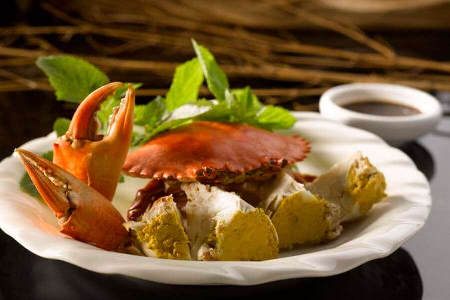 crab dish served on a white plate