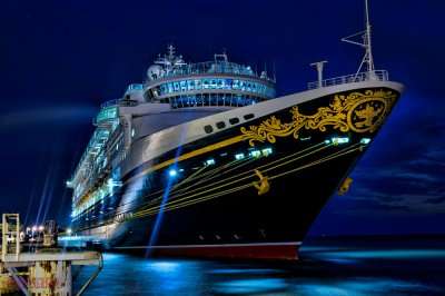 a disney cruise line at night