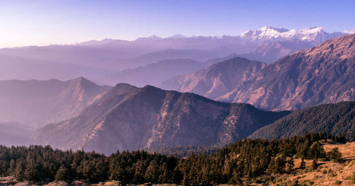 a layer if mountains in mist