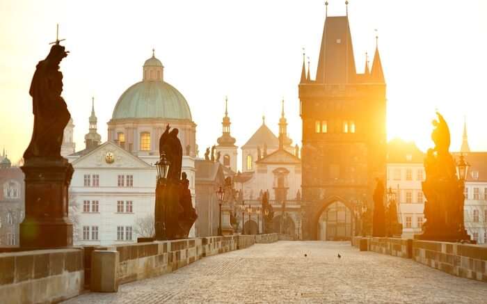 A view of Charles Bridge in Prague at the sunrise