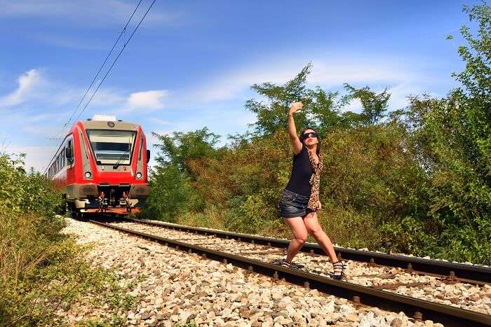 girl train track selfie