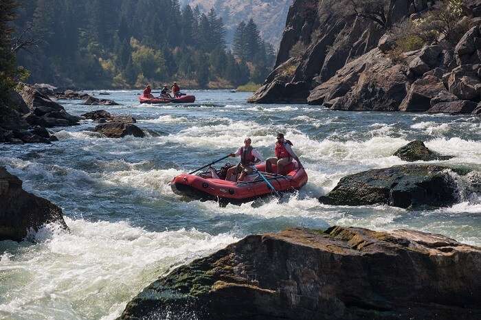 Tourists enjoying White Water Rafting
