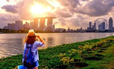 woman looking at singapore skyline in june
