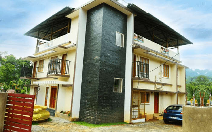 a cottage of Ayursakthi Riverdale Resort