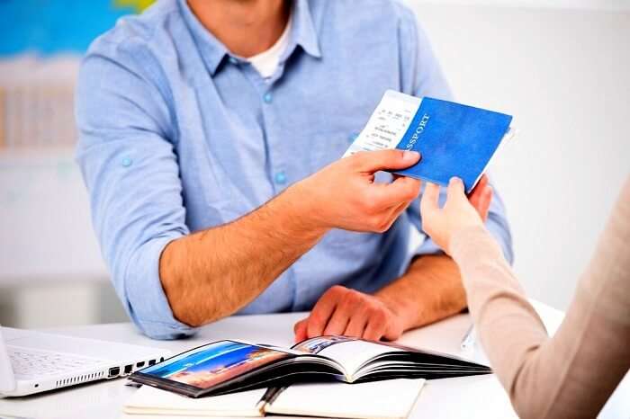 woman applying for visa at airport