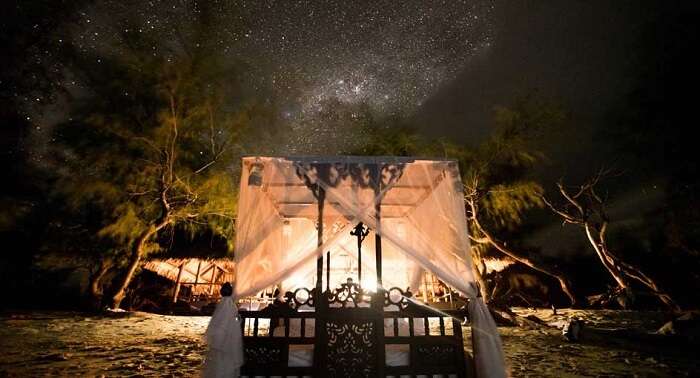 Four poster bed underneath the stars