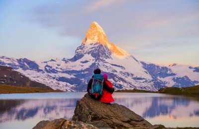 couple admiring Swiss Alps