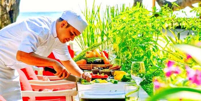 chef displaying preparation of Maldivian cuisine