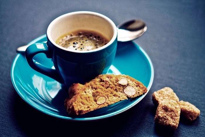 a cup of coffee with toast